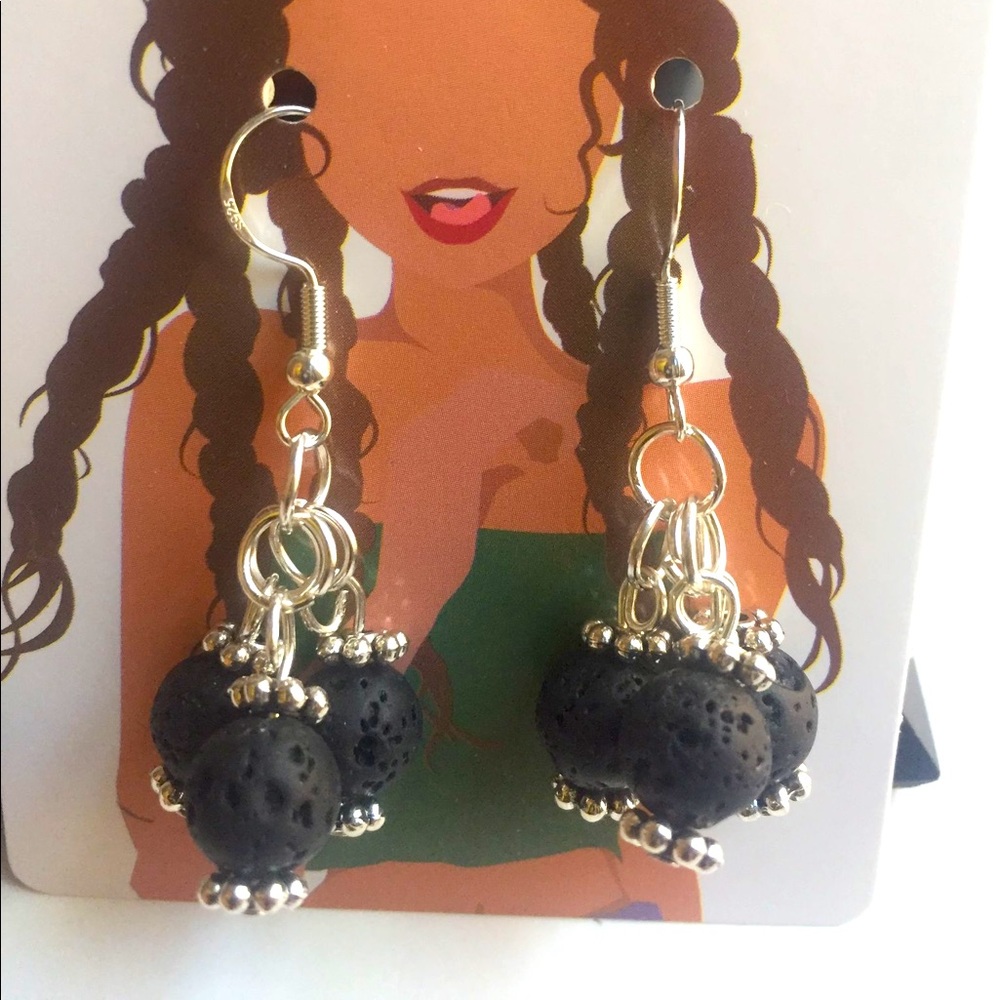 Cluster earrings of black lava pearls
